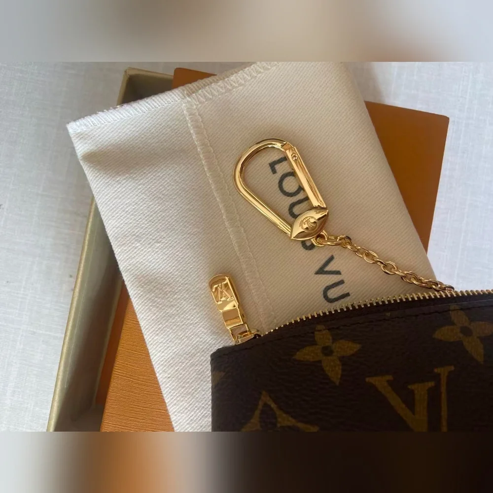 Louis Vuitton Monogram Zipped Key Pouch in Brown with Gold Hardware